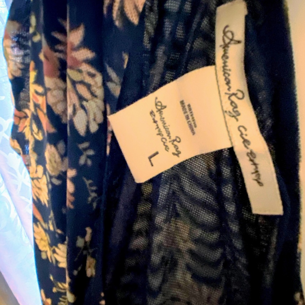 American Rag - Picture 9 of 9